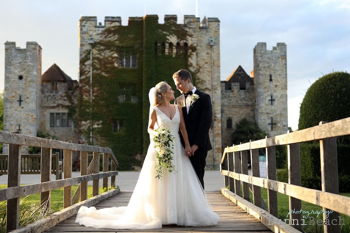front of hever castle wedding love