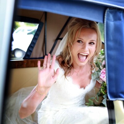 candid wedding car