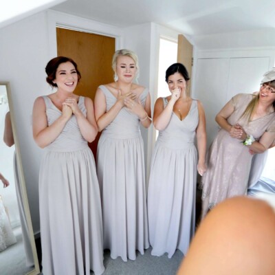 candid wedding photographer bride reveal
